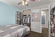 28422 N 32nd Ln, Phoenix, AZ 85083 - bedroom featuring ceiling fan and dark carpet