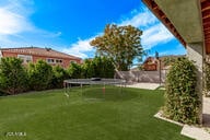 28422 N 32nd Ln, Phoenix, AZ 85083 - view of yard with a trampoline and a fenced backyard