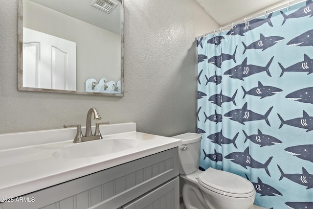 28422 N 32nd Ln, Phoenix, AZ 85083 - bathroom featuring visible vents, a textured wall, toilet, curtained shower, and vanity