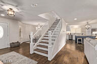 28422 N 32nd Ln, Phoenix, AZ 85083 - foyer featuring stairs, dark wood-style flooring, recessed lighting, and a notable chandelier