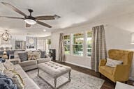 28422 N 32nd Ln, Phoenix, AZ 85083 - living area featuring ceiling fan with notable chandelier