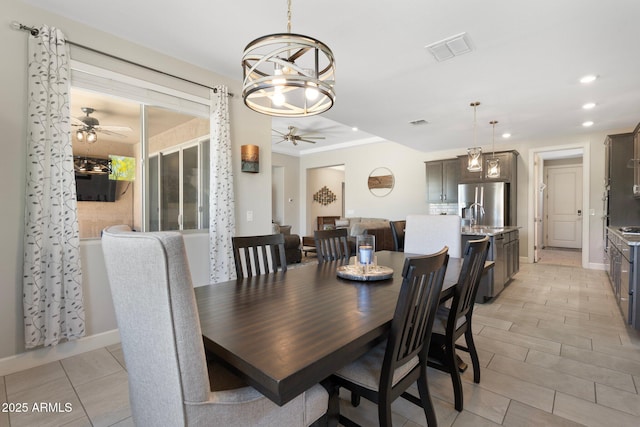 15663 S 183rd Dr, Goodyear, AZ 85338 - dining area with recessed lighting, baseboards, visible vents, and ceiling fan with notable chandelier