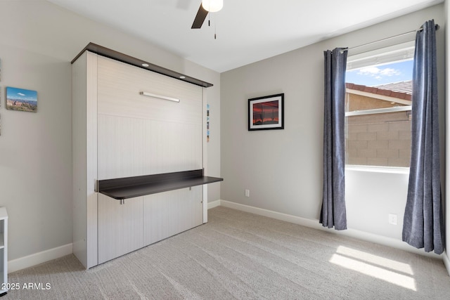 15663 S 183rd Dr, Goodyear, AZ 85338 - unfurnished bedroom with carpet, a ceiling fan, and baseboards