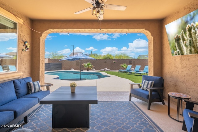 15663 S 183rd Dr, Goodyear, AZ 85338 - view of patio / terrace with a ceiling fan, a fenced in pool, a fenced backyard, and an outdoor living space