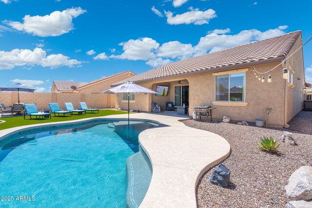 15663 S 183rd Dr, Goodyear, AZ 85338 - view of pool featuring a patio area, a fenced backyard, a fenced in pool, and a ceiling fan