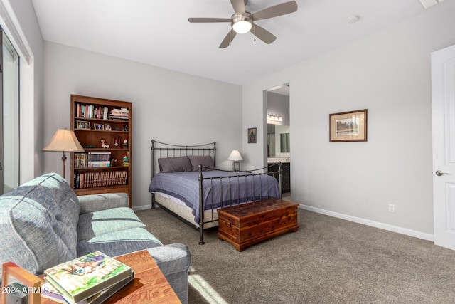 carpeted bedroom featuring connected bathroom, baseboards, and a ceiling fan