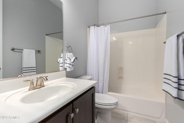 full bath with vanity, tile patterned floors, shower / tub combo, and toilet