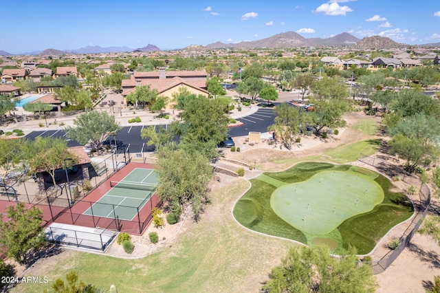 birds eye view of property featuring golf course view, a residential view, and a mountain view