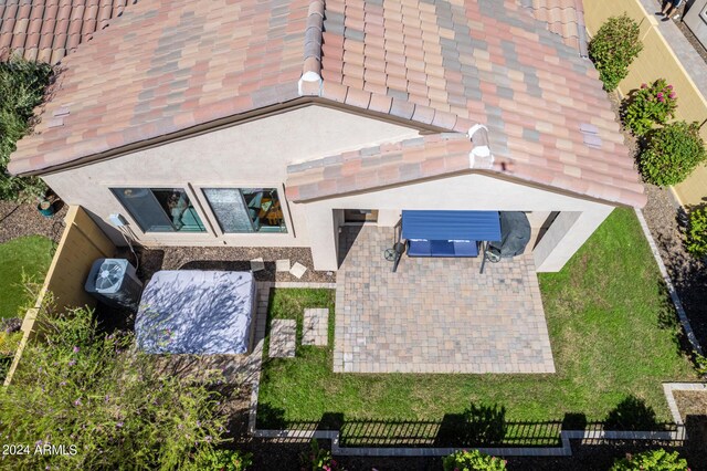 exterior space featuring a patio and a mountain view