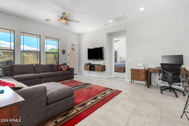living area featuring recessed lighting, visible vents, light tile patterned flooring, and a ceiling fan