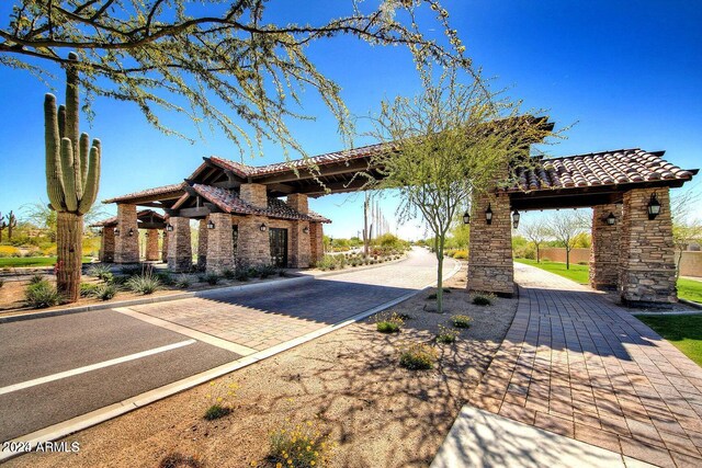 birds eye view of property with a mountain view