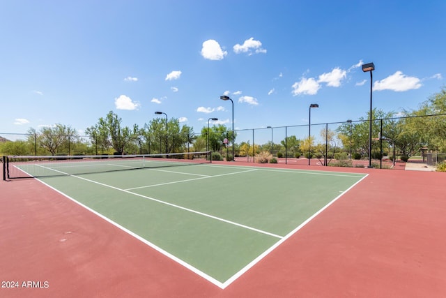 view of sport court with community basketball court and fence