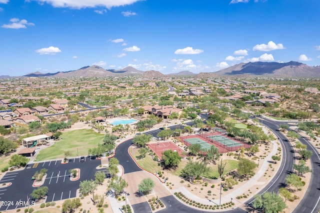 birds eye view of property with a mountain view