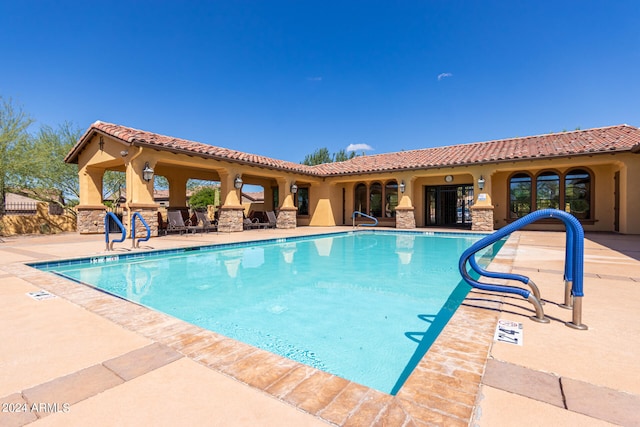 view of pool with a patio