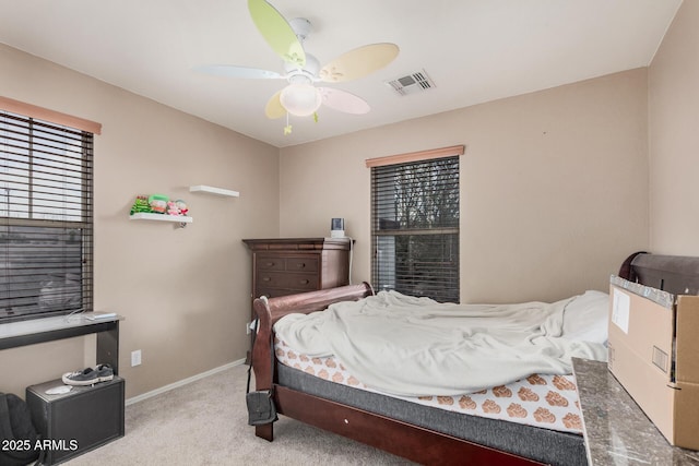 2748 E Dennisport Ave, Gilbert, AZ 85295 - carpeted bedroom with baseboards, a ceiling fan, and multiple windows