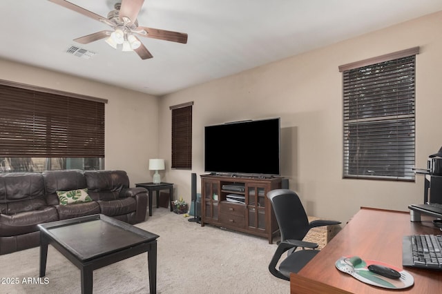 2748 E Dennisport Ave, Gilbert, AZ 85295 - carpeted living room with a ceiling fan and an office area
