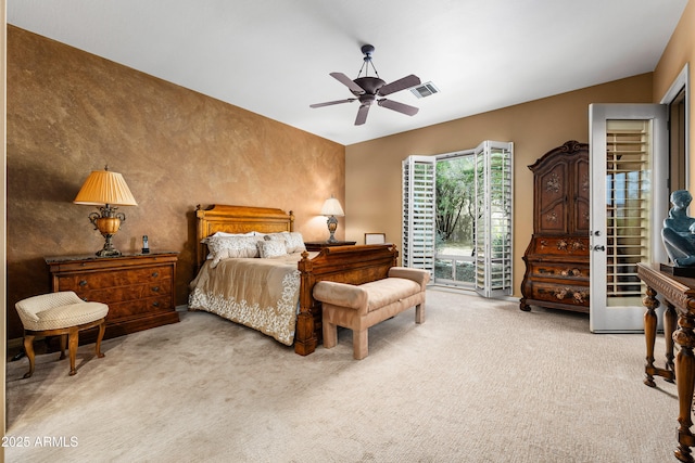 carpeted bedroom featuring vaulted ceiling, ceiling fan, visible vents, and access to exterior