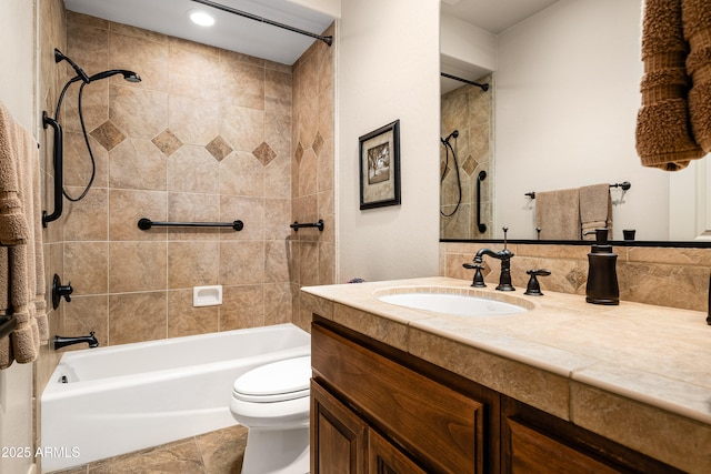 bathroom with shower / bath combination, vanity, and toilet