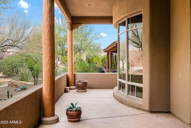 view of patio with a balcony