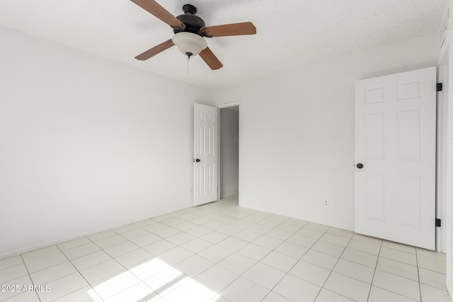 3042 N 87th Ave, Phoenix, AZ 85037 - empty room with ceiling fan and a textured ceiling