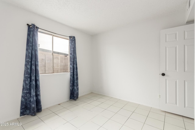 3042 N 87th Ave, Phoenix, AZ 85037 - empty room with a textured ceiling