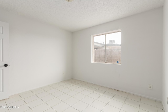 3042 N 87th Ave, Phoenix, AZ 85037 - spare room with a textured ceiling