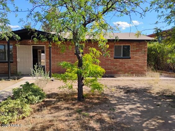 2435 E 13th St, Douglas, AZ 85607 - view of property exterior featuring brick siding
