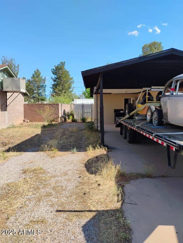 2435 E 13th St, Douglas, AZ 85607 - view of side of property featuring stucco siding