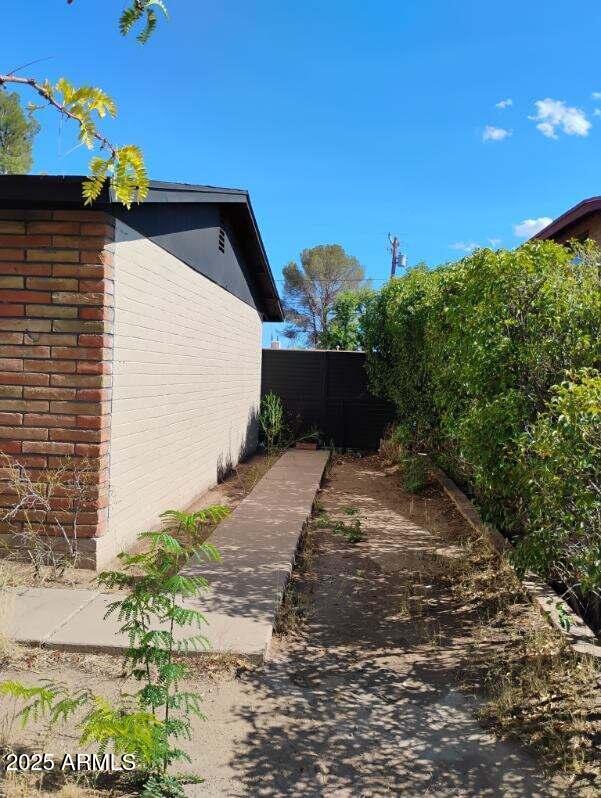 2435 E 13th St, Douglas, AZ 85607 - view of side of property featuring brick siding