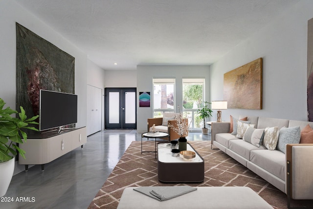 living room featuring a textured ceiling and french doors