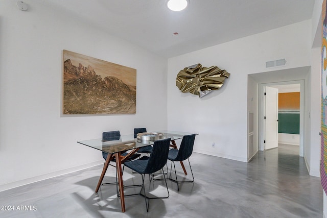 office area featuring concrete flooring