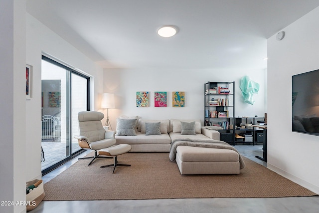 living room with concrete floors