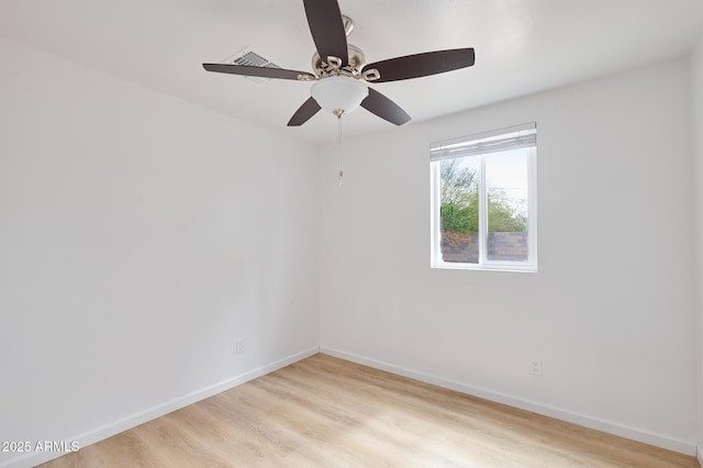 751 E Southern Ave, Phoenix, AZ 85040 - spare room with light wood-type flooring, baseboards, and a ceiling fan
