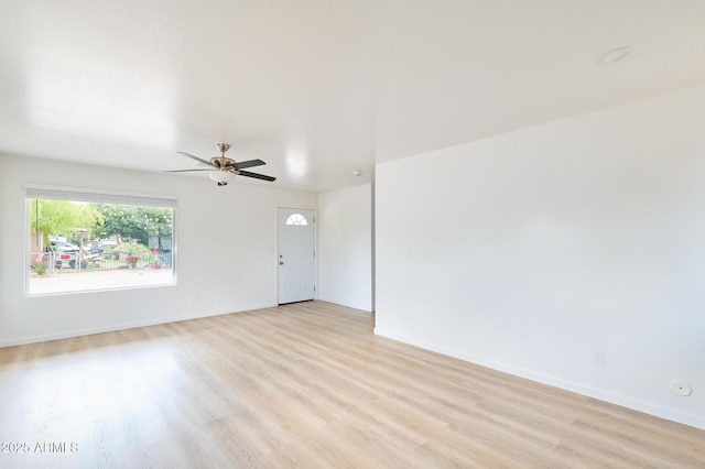 751 E Southern Ave, Phoenix, AZ 85040 - empty room featuring ceiling fan, light wood finished floors, and baseboards