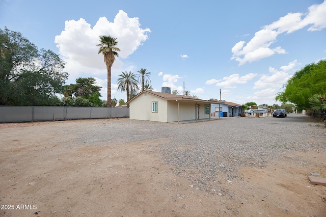 751 E Southern Ave, Phoenix, AZ 85040 - back of house featuring fence and cooling unit