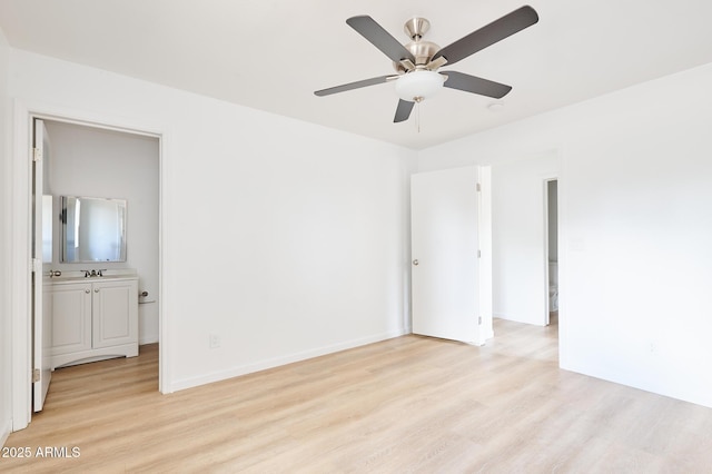 751 E Southern Ave, Phoenix, AZ 85040 - unfurnished bedroom featuring light wood-style flooring and baseboards