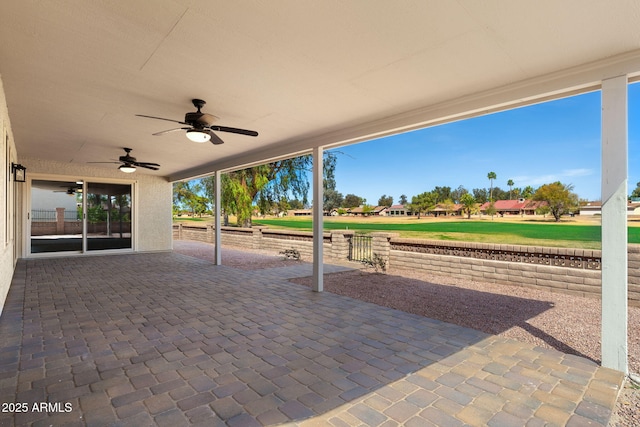 view of patio / terrace featuring ceiling fan