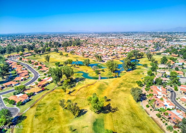 drone / aerial view with a residential view and view of golf course