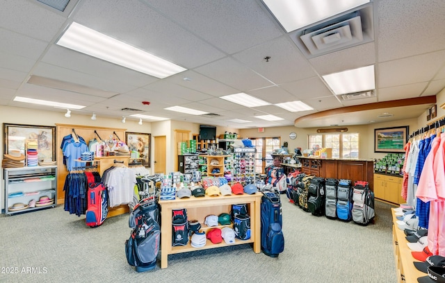 miscellaneous room featuring carpet flooring, visible vents, and a drop ceiling