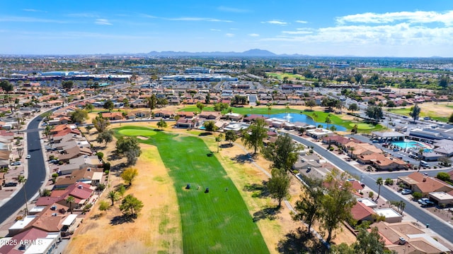 birds eye view of property featuring a mountain view, a residential view, and view of golf course