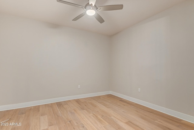 unfurnished room featuring light hardwood / wood-style floors and ceiling fan