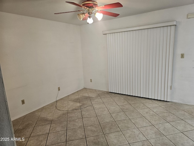 unfurnished room featuring a ceiling fan