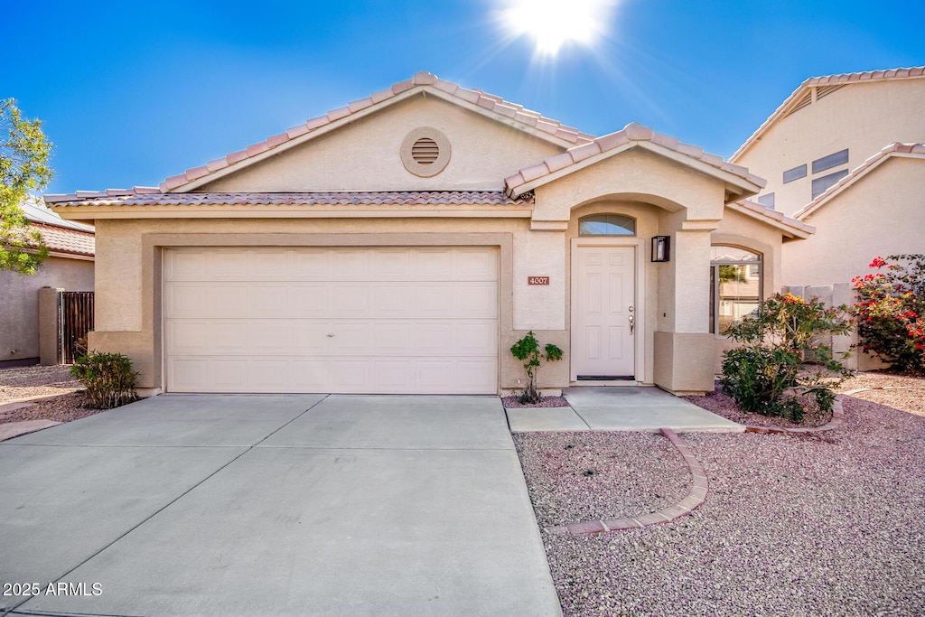 view of front of property with a garage