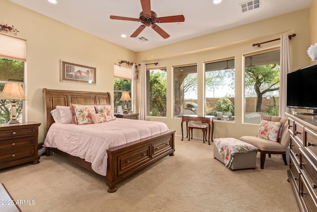 carpeted bedroom with ceiling fan