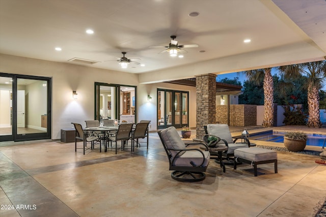 view of patio with ceiling fan and french doors