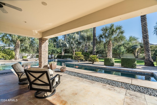 view of patio / terrace featuring ceiling fan