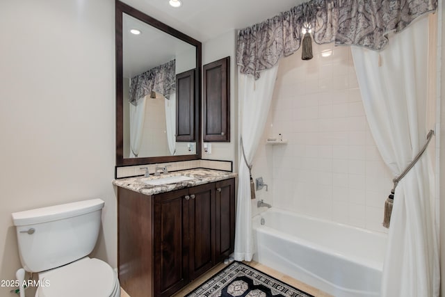 bathroom with vanity, shower / bath combination with curtain, toilet, and recessed lighting