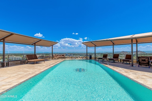 pool with a patio area