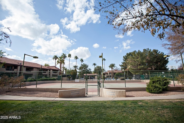 view of property's community featuring a lawn