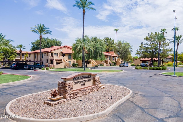 view of street with a residential view and curbs